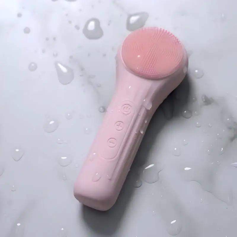 Siliconen gezichtsreinigingsborstel Roze Waterdichte oplaadbare trillingsverwarming Diep schone gezichtsreiniger Gezichtsreinigingsborstel