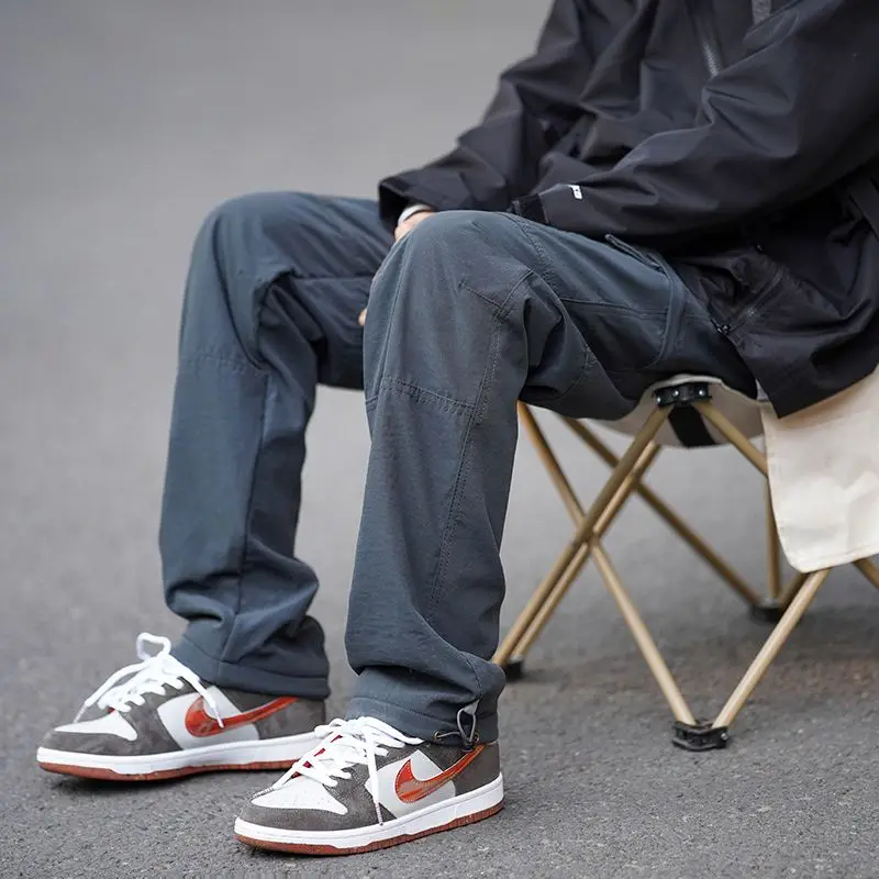 Pantalones Cargo con bolsillos y personalidad para hombre, pantalón clásico con cordón de cintura suelta, a la moda, combina con todo, primavera y otoño, 2023