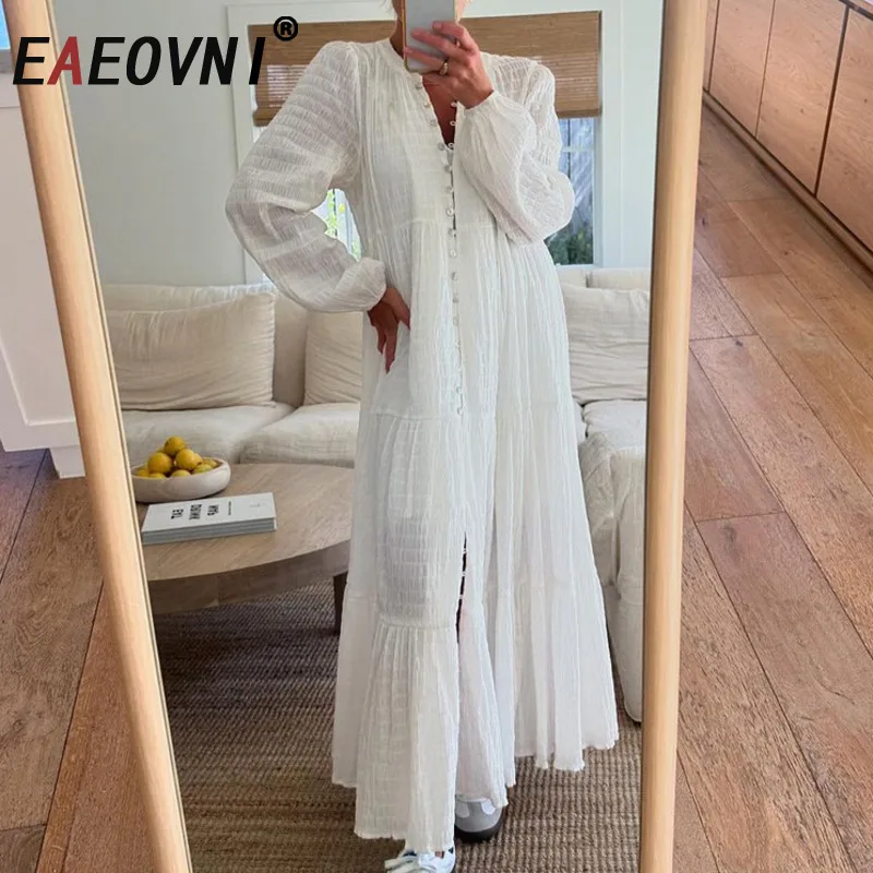

EAEOVNI Повседневное белое длинное платье для женщин с v-образным вырезом и складками на пуговицах, с рукавами-фонариками, трапециевидные платья, мода 2025, новая одежда 1A1209