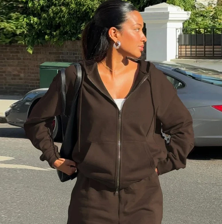 

Комплект из 2 предметов: толстовка на молнии с капюшоном и облегающие повседневные брюки на шнурке. Женская осенне-зимняя спортивная одежда. Новинка.