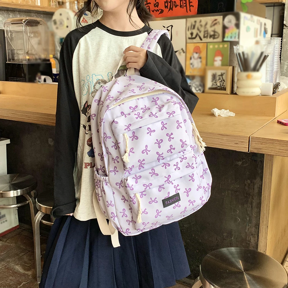 Strikprint Leuke rugzak Damesrugzakken Waterdichte nylon rugzak met meerdere zakken Cartoon mode Schoolrugzak voor tienermeisjes