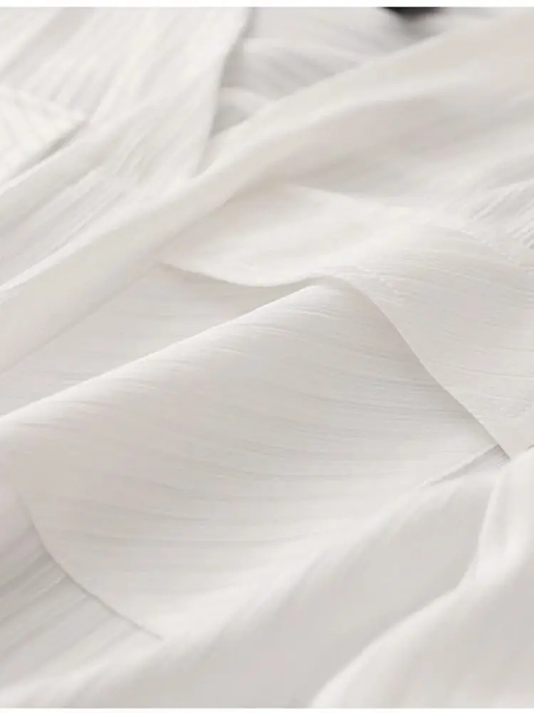 スタイリッシュな V ネックストライプシャツ女性の夏の新ファッションハイエンドルーズ痩身薄型ノースリーブトップ