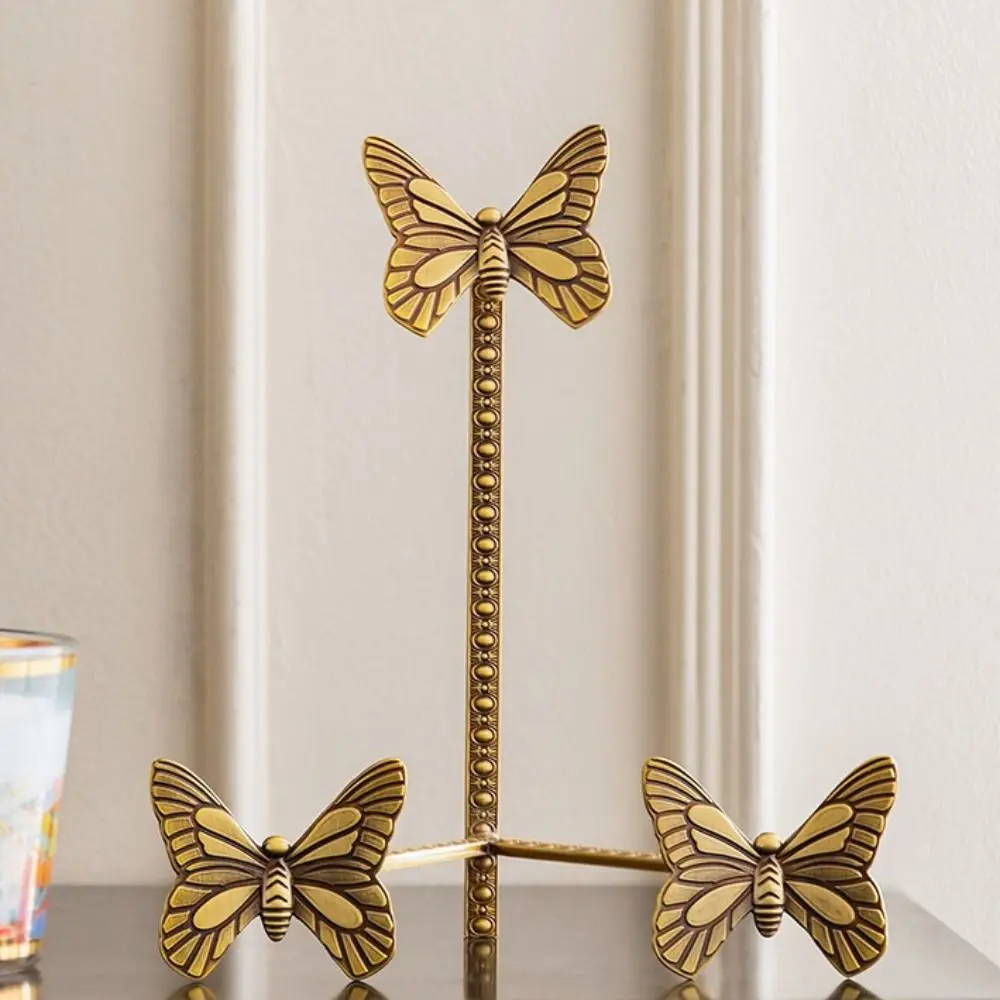 

Винтажный дизайн, подставка для тарелок из сплава в виде бабочки, светильник, роскошный стиль, мотив бабочки, элегантная настольная витрина, латунный обеденный стол
