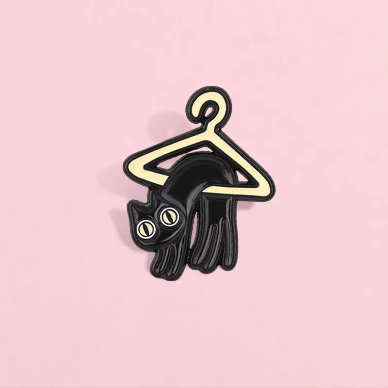 Creative clothes hanger small black cat metal brooch funny cat cartoon pin poop shoveling official niche badge accessory