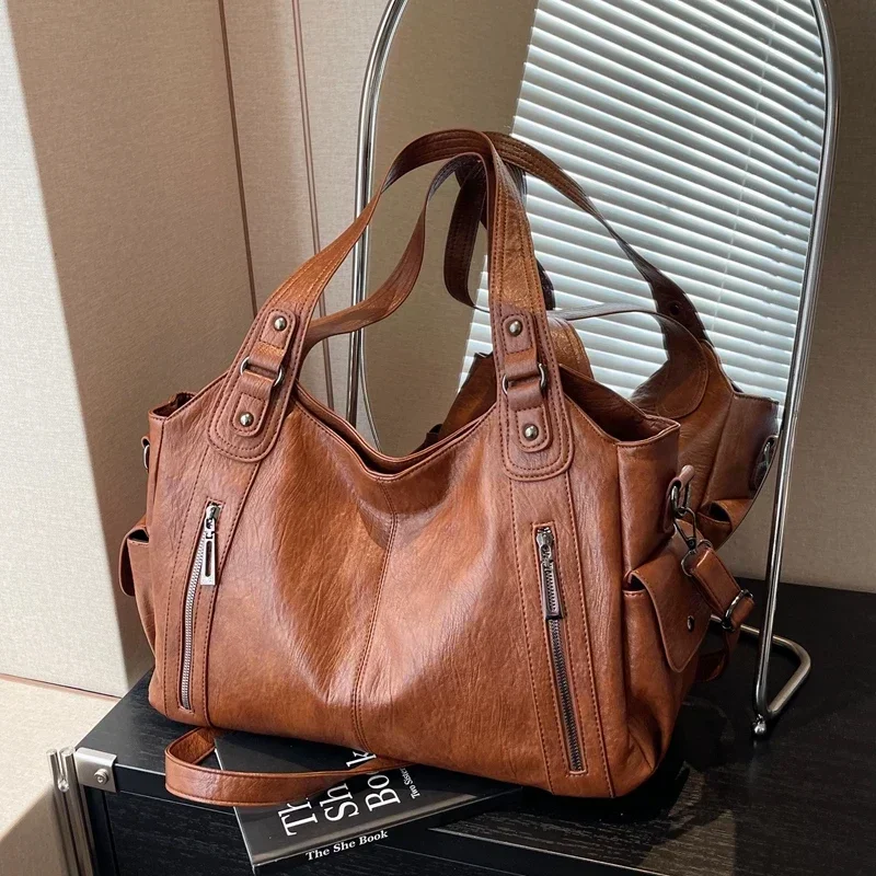 2024 High Quality Women's Bag New Urban Trend Style Shoulder Bag Versatile Casual Large Capacity Commuter ZipperHandbag우아한 여자 가방