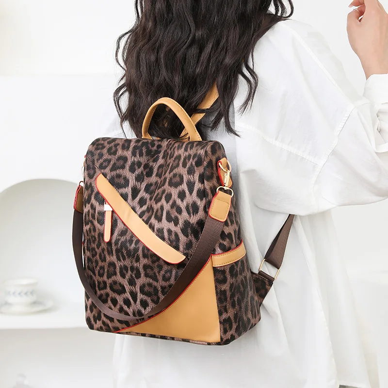 New shoulder bag fashion ladies backpack multi-purpose hand bill of lading shoulder slung leopard print bag student bag.