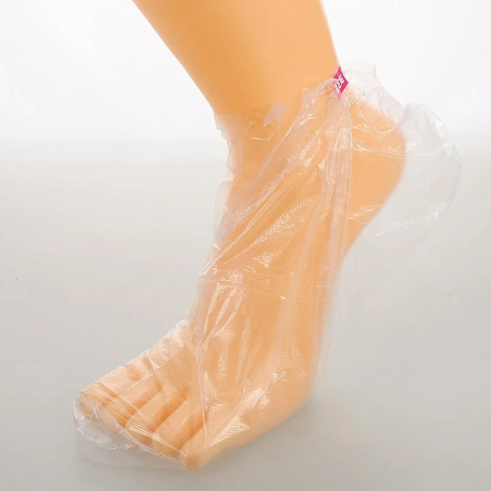 100 Uds máscara calcetines desechables cubiertas de plástico botines de Spa impermeables terapia de pies transparente herramientas de cuidado de los pies para mujeres