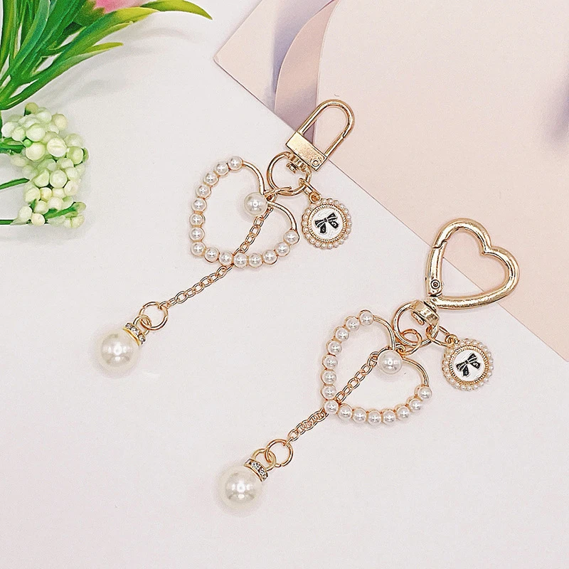 

Fashion Bow Key Chain Elegant Heart Pearl Tassel Keyring Handbag Ornament Alloy Pendant Headphone Case Car Trinkets DIY Gift