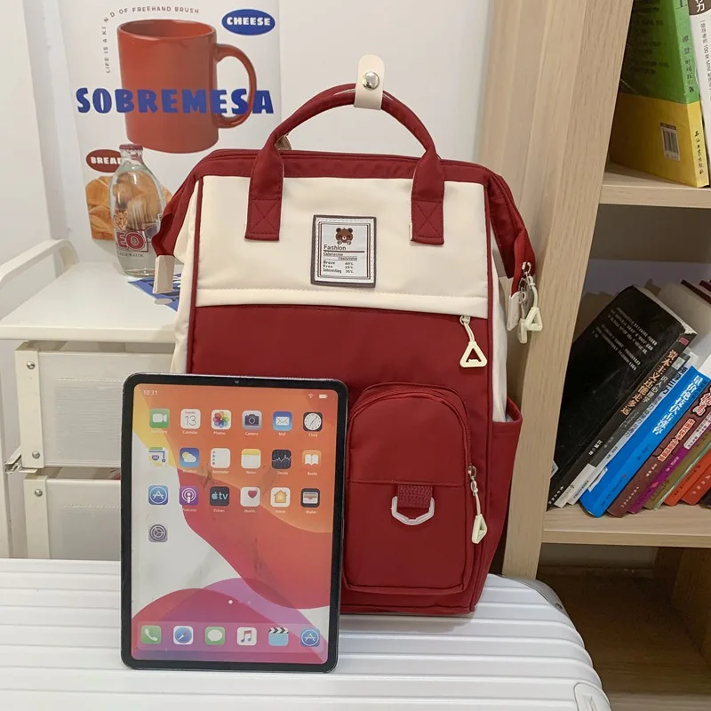 Mulheres náilon mochila doce cor à prova dwaterproof água sacos de escola para adolescentes meninas meninos mochila feminina casual estilo simples