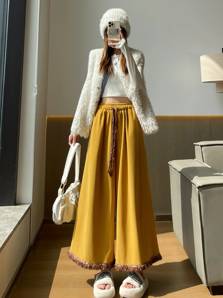 Retro corduroy tassel wide leg pants women's autumn and winter loose and super beautiful 9-point casual large leg skirt