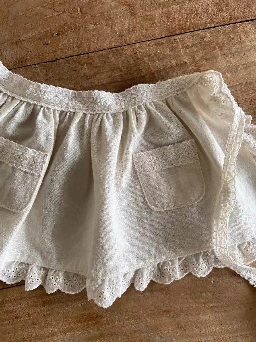 2025 Autumn New Baby Girl Cute Lace Pocket Small Apron Infant Toddler Sweet Floral Princess Skirts Cotton Baby Girl Mini Skirts