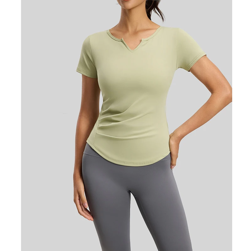 Haut de sport d'été pour femme à col en V, manches courtes, séchage rapide, respirant, pour le yoga, la course et le fitness, avec design froncé