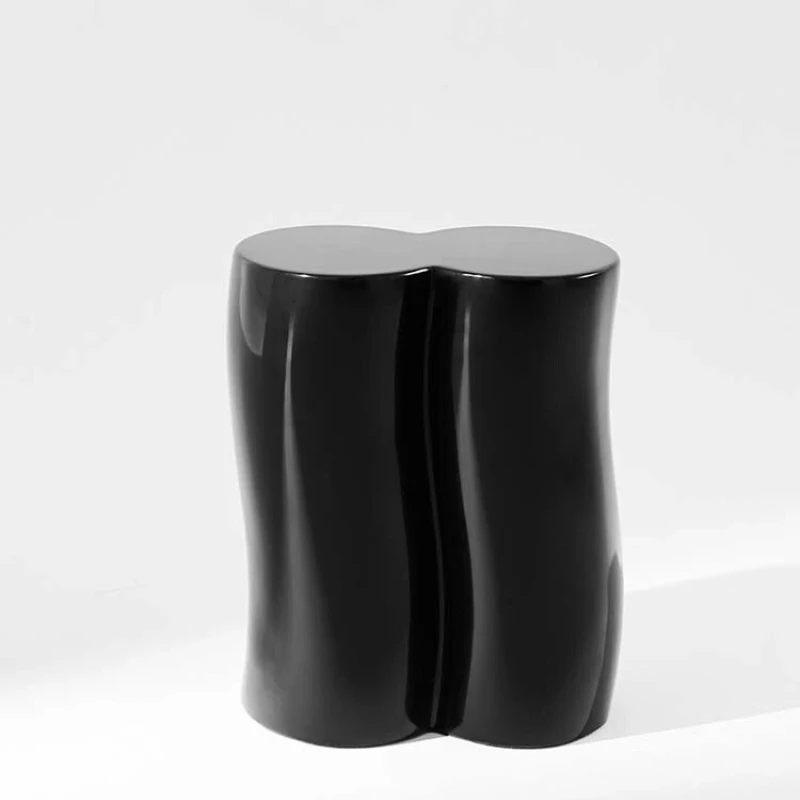 A low  a stool that can be seated and moved
