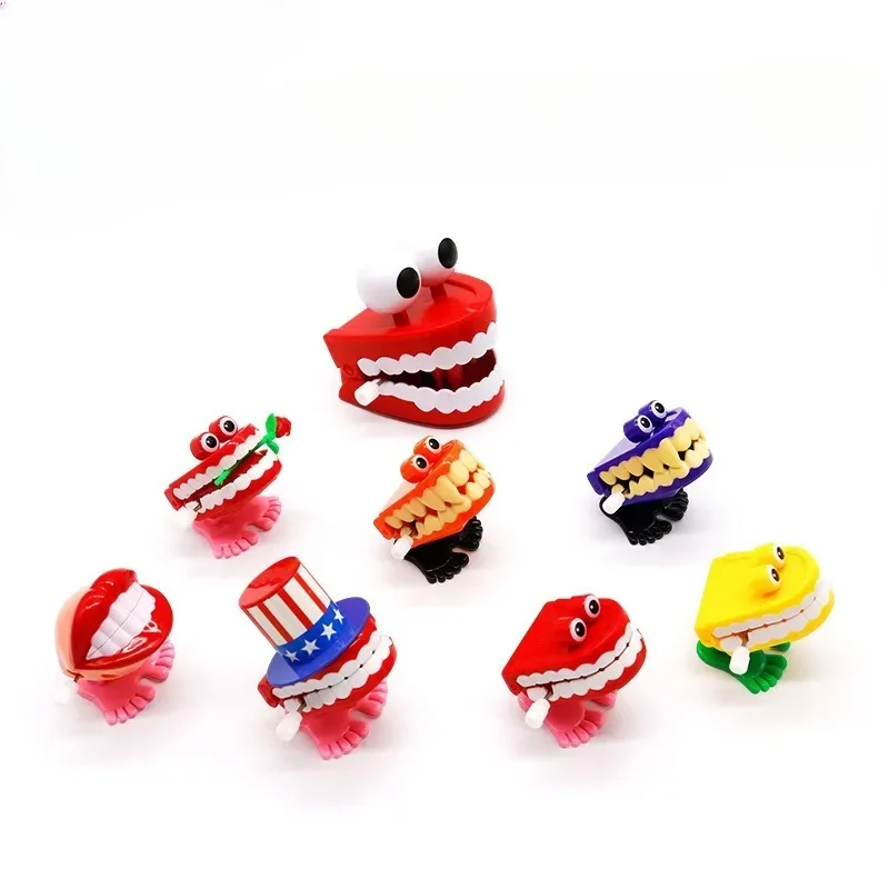 

Windup Toy Teeth-shaped Bouncing Teeth Jumping Frog Chain Windup Toy Wholesale Creative Dental Gifts Walking Dentist Gifts New