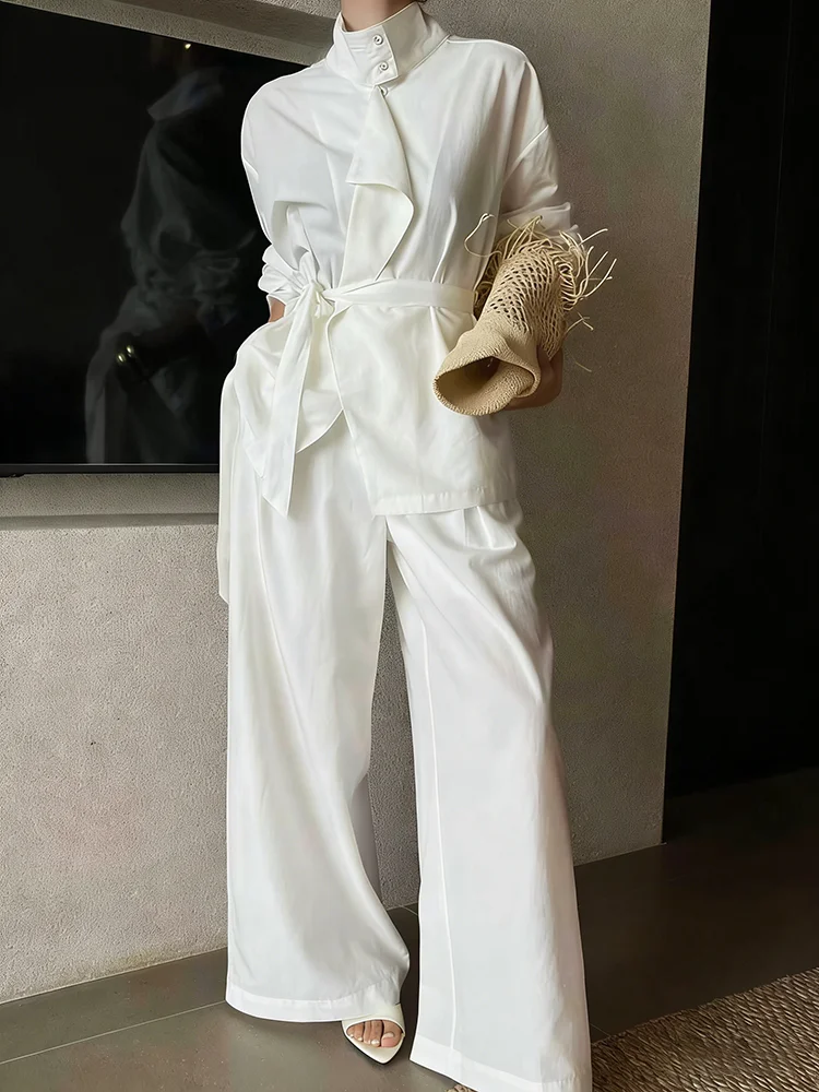 

Костюм BJTZ 2026: Женский комплект из двух предметов — куртка с воротником-стойкой и завязками на талии, брюки с широкими штанинами. Повседневный стиль.