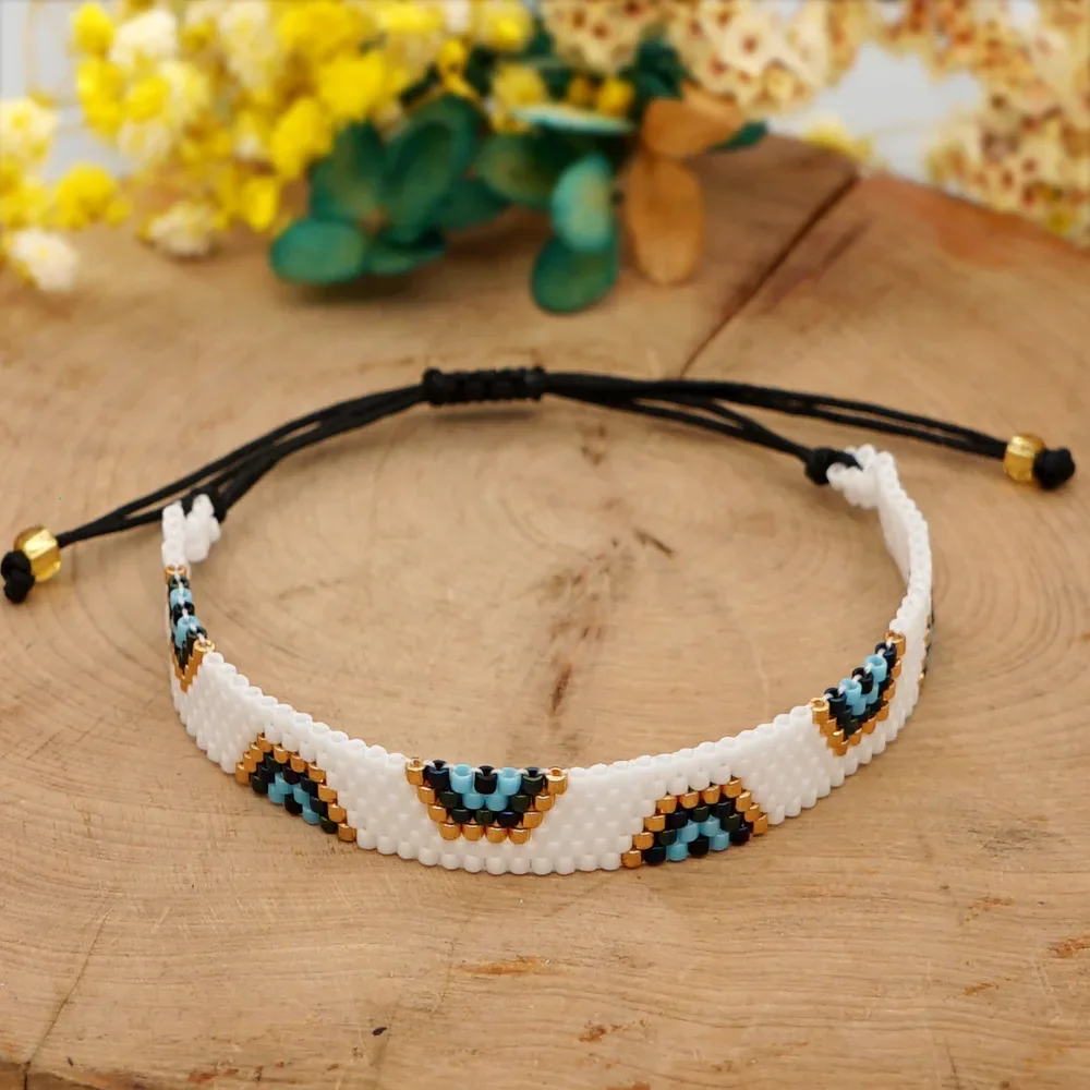 

Rice Ball Bracelet Hand woven Simplicity geometry Blue eyes fashion Bohemia Adjustable Unisex Beaded Bracelet