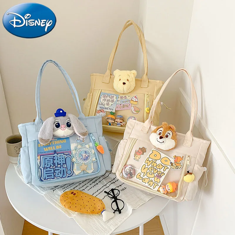 

Disney New Winnie The Pooh Cartoon Pain Bag, Large Capacity Tote Canvas Bag for Female College Students for Class and Commuting.