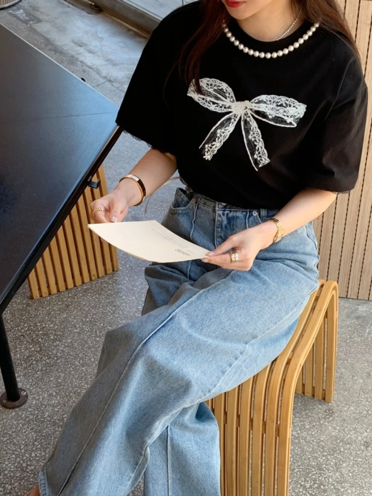 T-shirt da donna estiva nuova con stampa nodo in pizzo ort Sve Pearl round Ne Loose Top coreano Sle Pendolarismo Faion