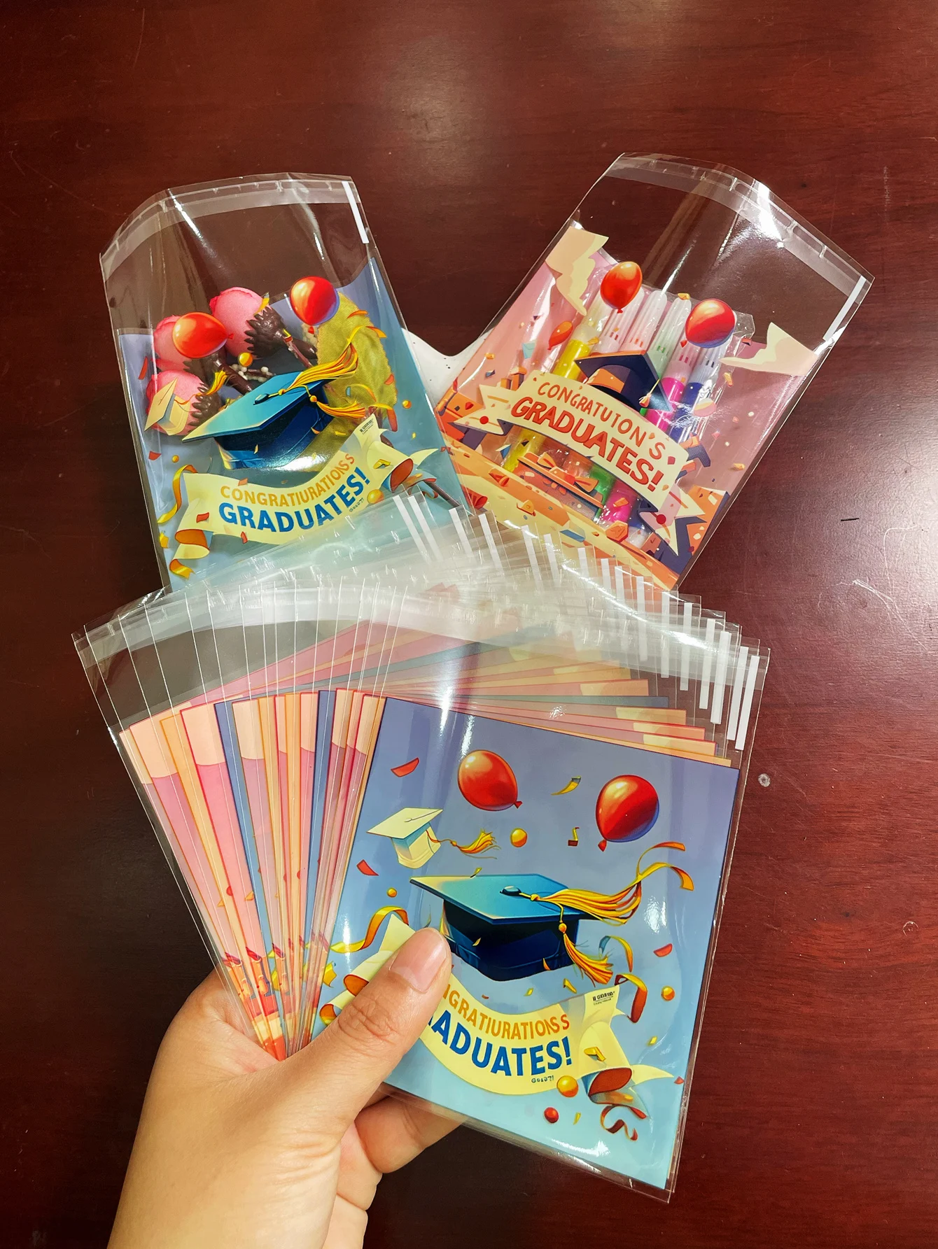 100 Uds. Embalaje de regalo para fiesta de graduación bolsas autoselladas OPP, tapa de temporada de graduación cinta de globo Mini bolsas de regalo impresas