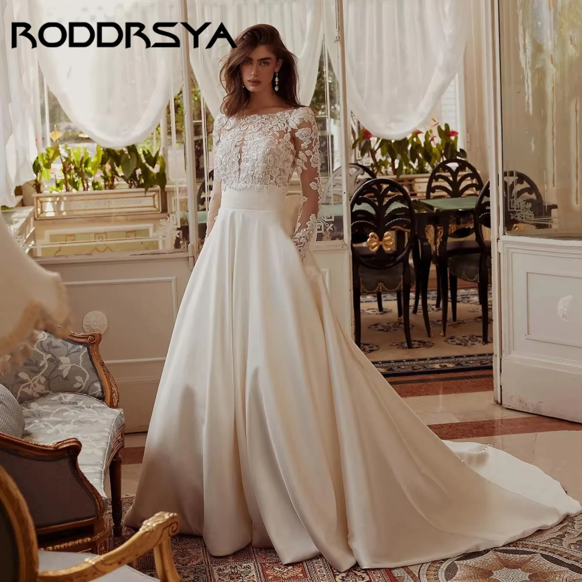 فساتين زفاف أنيقة على شكل حرف a مثيرة بأكمام طويلة بدون ظهر فستان زفاف بفيونكة دانتيل فساتين العروس الفاخرة فيستدو دي نوفيا مخصصة أنيق خط مثير فساتين الزفاف الأكمام الطويلة خلفية فستان العروس الدانتيل قوس فساتين العروس
