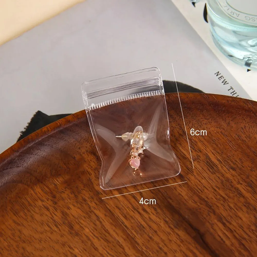 100 Stück kleine transparente PVC-Schmuckaufbewahrungsbeutel, kleine Zubehör- und Perlenverpackung, Anti-Oxidationsbeutel, selbstverschließende Plastiktüten – Detail 1