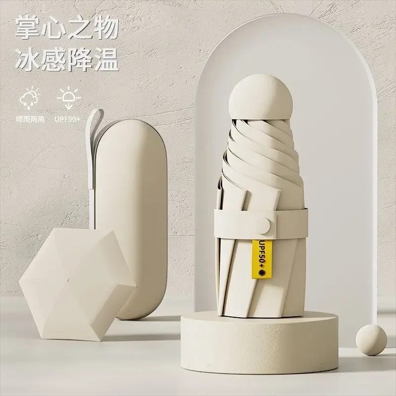 

Compact and portable capsule umbrella with double-layered black film for sun protection, suitable for both sunny and rainy days.