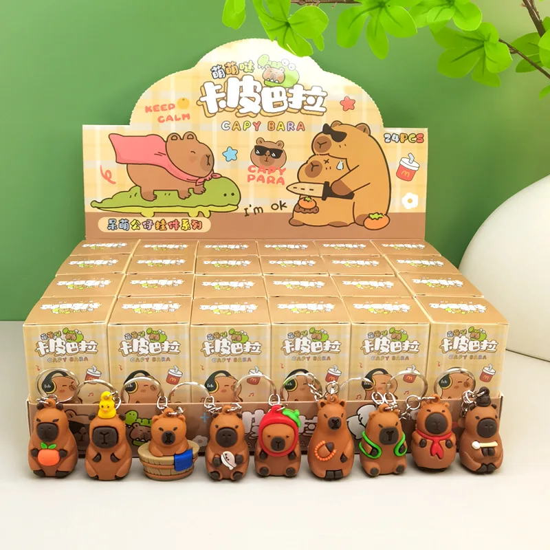 

24 into the Capibala blind box game with the same hand doll online celebrity Keychain gift sanrio surprise box toy
