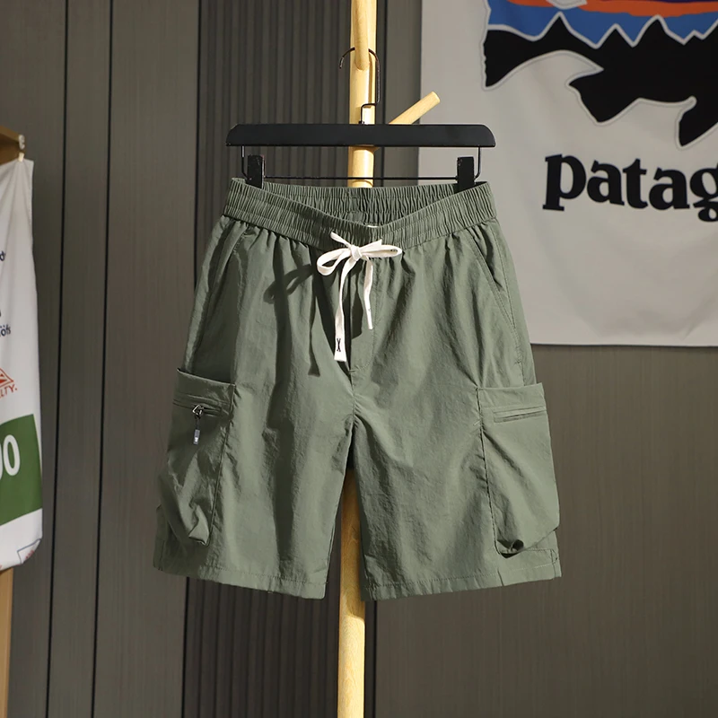 

Летние мужские шорты с карманами на молнии и эластичной резинкой на талии, быстросохнущие повседневные модные уличные свободные мужские шорты до колена