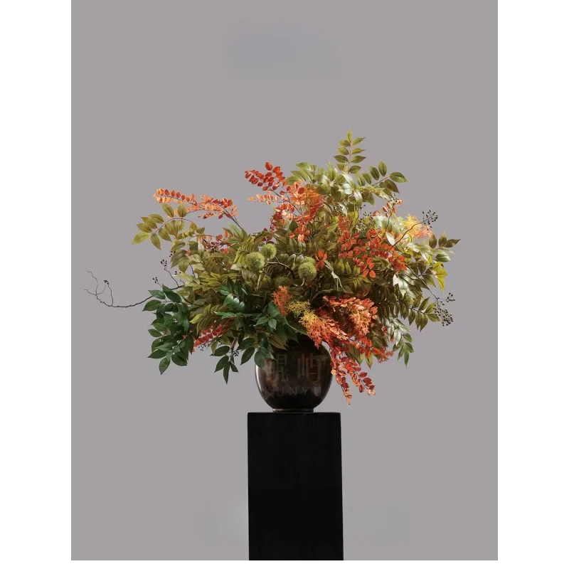 Chinese-style high-end floral ornament, green plant simulation flower in the tea room of the hotel front desk