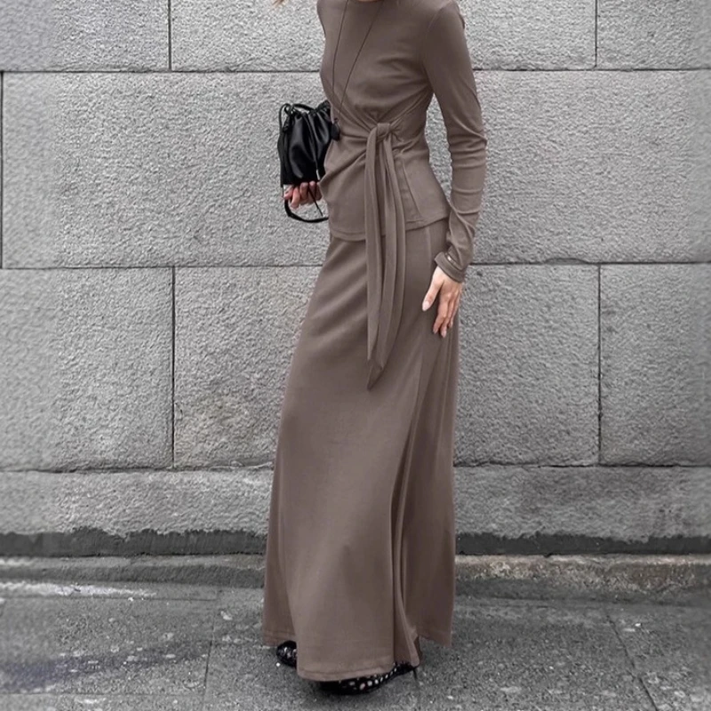 

Элегантный винтажный комплект с трикотажной юбкой цвета хаки, модный простой топ с круглым вырезом 2025, юбка трапециевидной формы, комплект из двух предметов