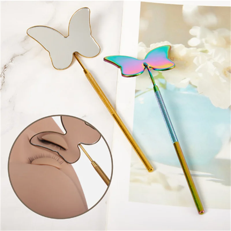 Grenzüberschreitender, exklusiver, schmelzender Wimpernverlängerungsspiegel aus Edelstahl für die Schönheitswimperninspektion, schmetterlingsförmiger Inspektionsspiegel