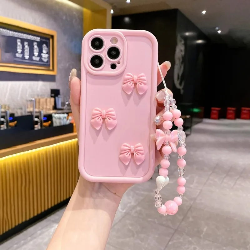 2Pcs Three-Dimensional Bow with Bracelet,Shock-Absorbing Pink Phone Case Suitable for Apple 16PROMAX/15PLUS/14PRO/13, iphone 12