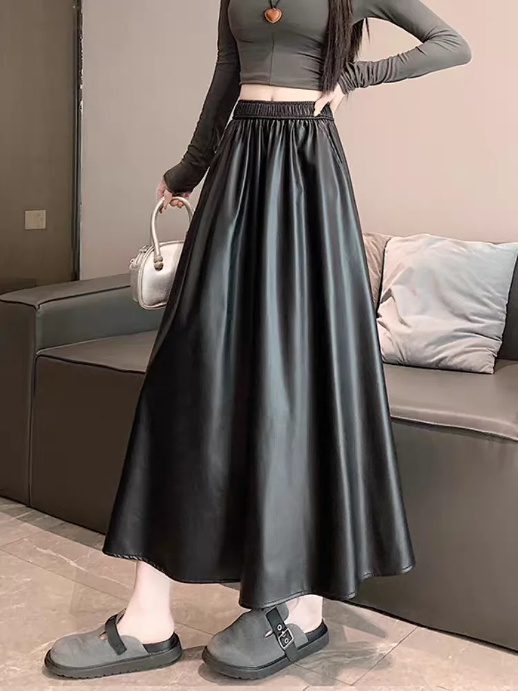 

Женская юбка трапециевидной формы из искусственной кожи: расклешенная плиссированная юбка с высокой талией и драпированным краем, осенняя юбка-миди с разглаживанием бедер 2025 г.