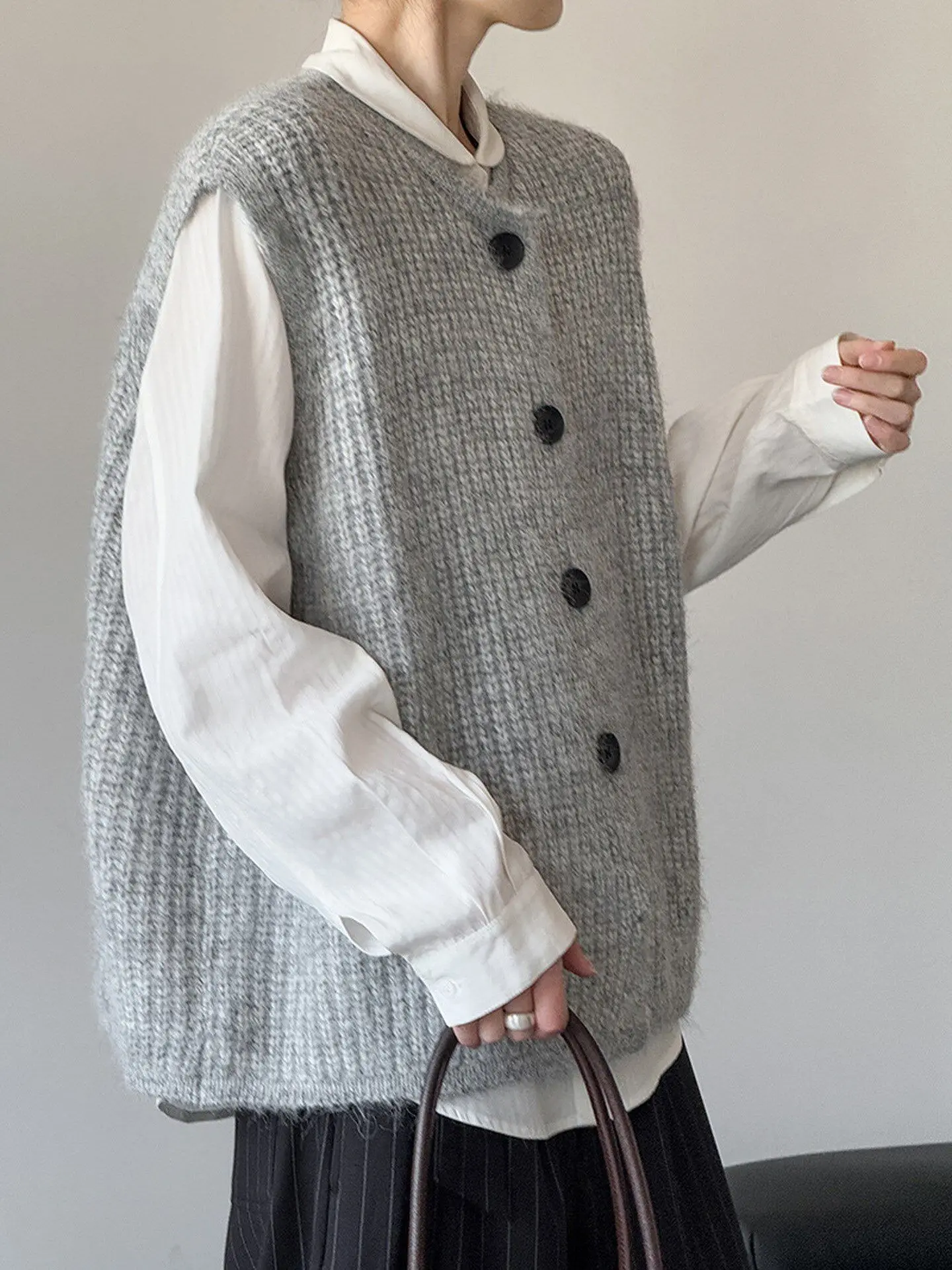 

Unique and beautiful stacked vest women's knitted vest cashmere cardigan with waistcoat and daily necessities sleeveless vest.