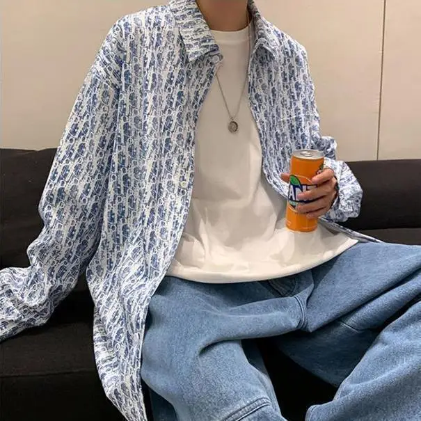 

Новые мужские модные свободные универсальные повседневные рубашки с длинными рукавами и воротником-поло с принтом на пуговицах