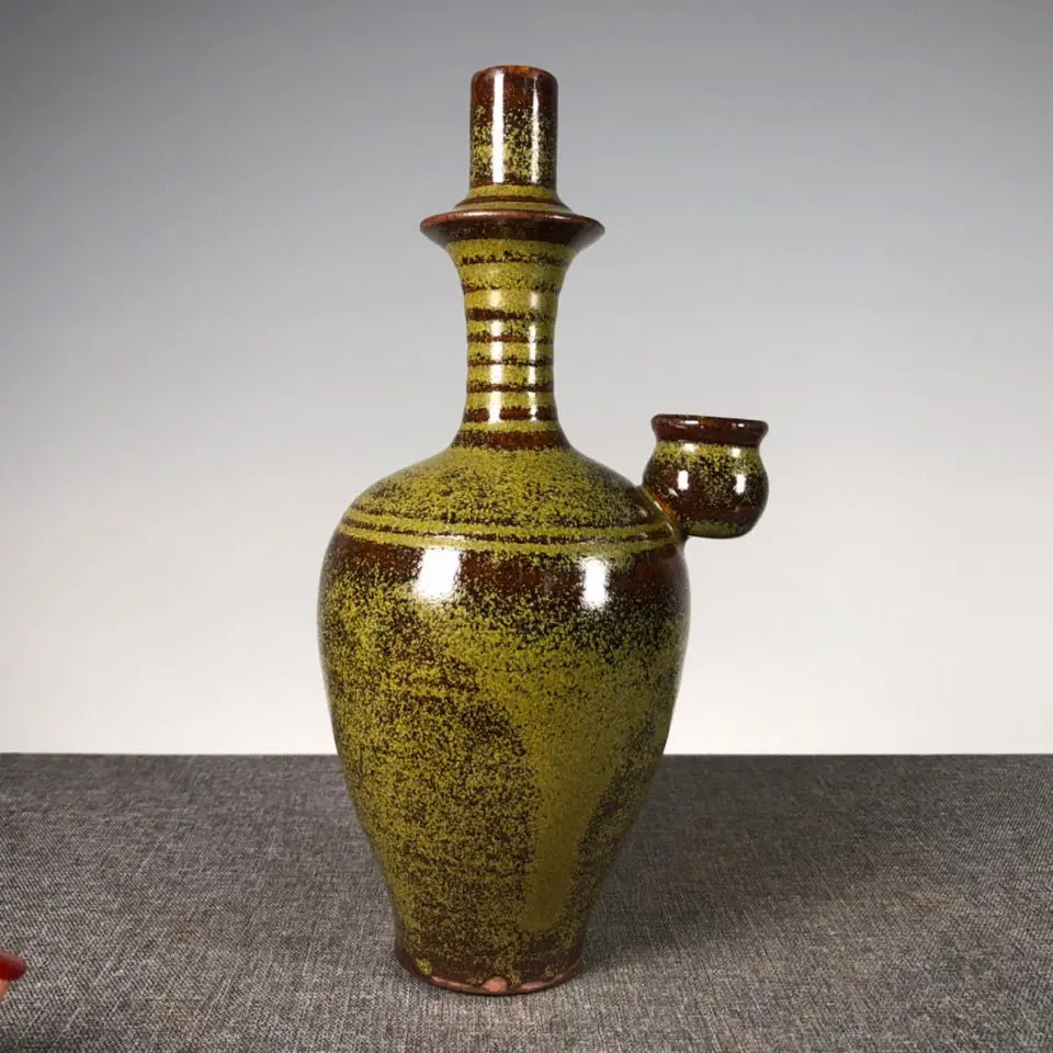 

Ancient Chinese antique porcelain antiques miscellaneous Qing Dynasty tea-leaf glaze narrow neck vase ornaments