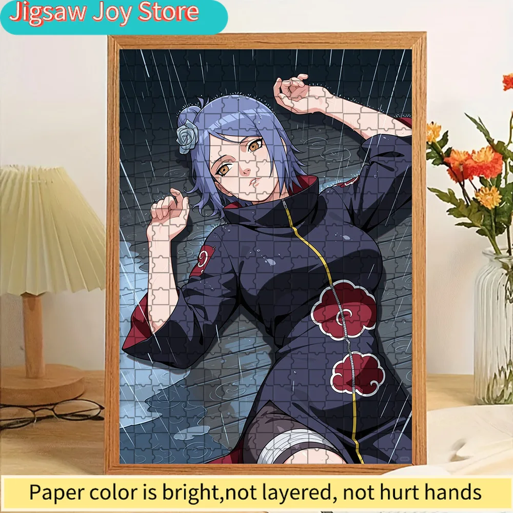

High Quality Paper Jigsaw Puzzle Anime Konan in Akatsuki Cloak Lying on Wet Ground in Rainy Scene Vivid Color Printed Premium Re