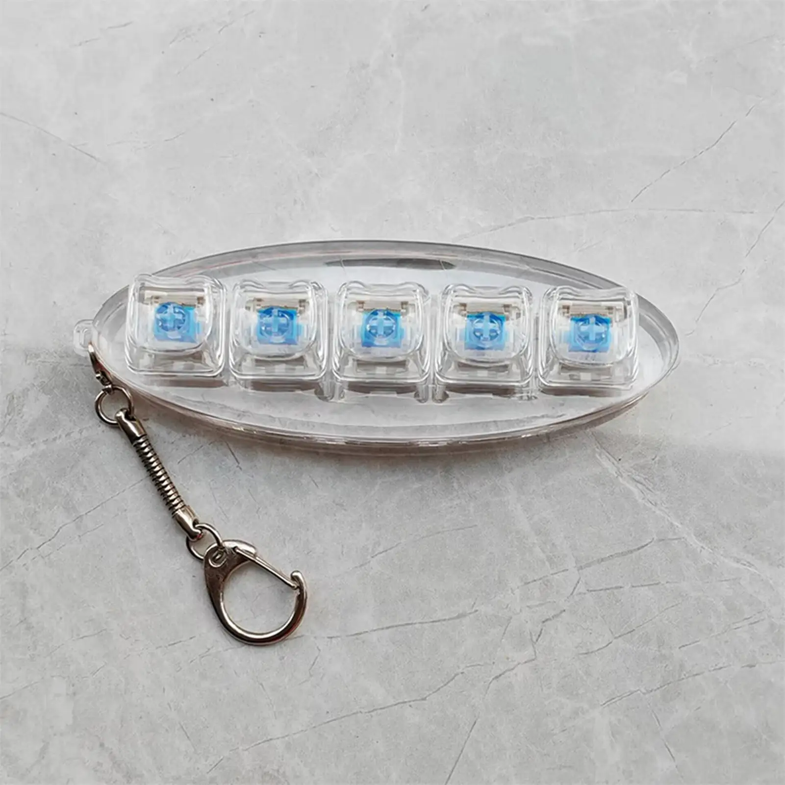 Tastiera da dito giocattolo meccanico portatile calma tastiera a 5 tasti portachiavi Fidget per donne adolescenti amici adulti viaggi a casa