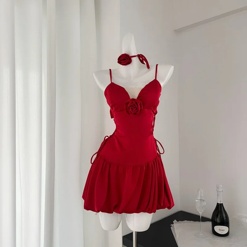 

French camisole dress for women in early spring, new style pure desire to show waist, tie up spicy girl flower bud fluffy skirt