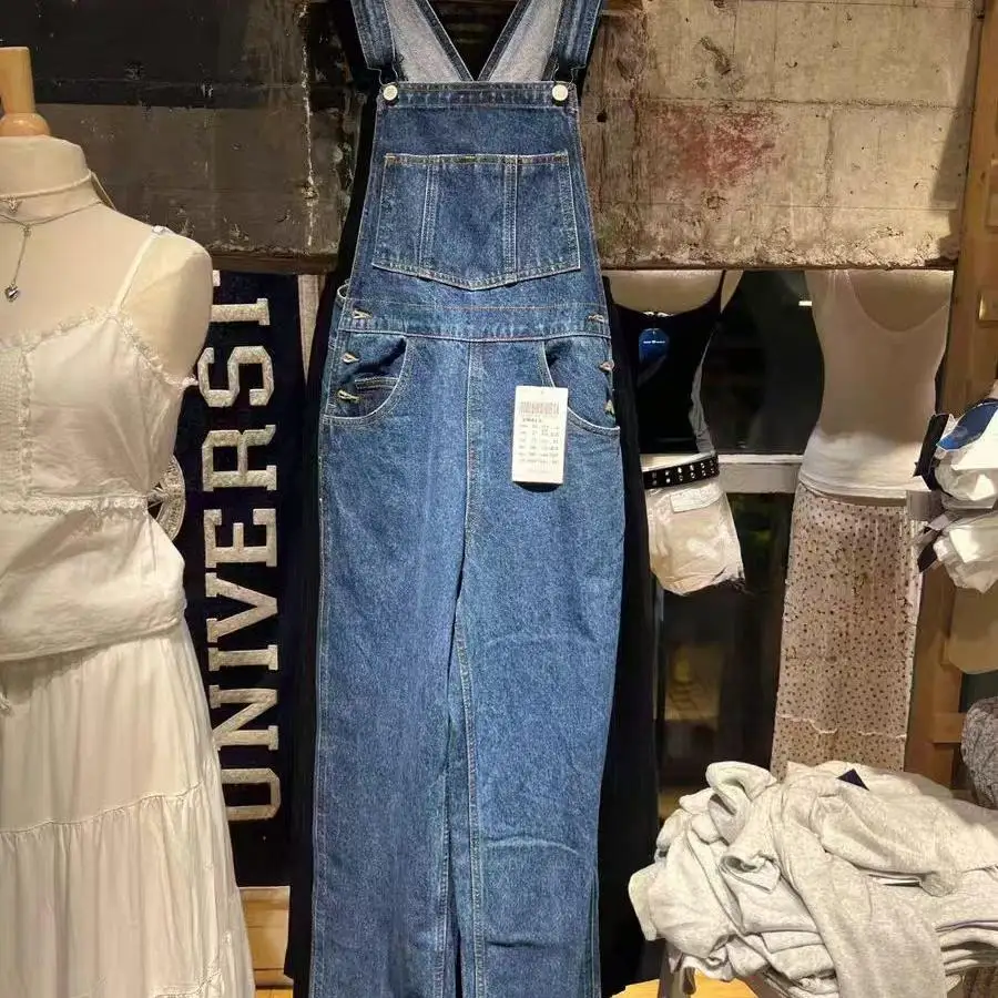 Damskie szerokie ogrodniczki jeansowe wyszczuplające, luźny krój, modne, z wysokim stanem, bawełniane, elastyczne jeansy, kolekcja na lato i jesień.