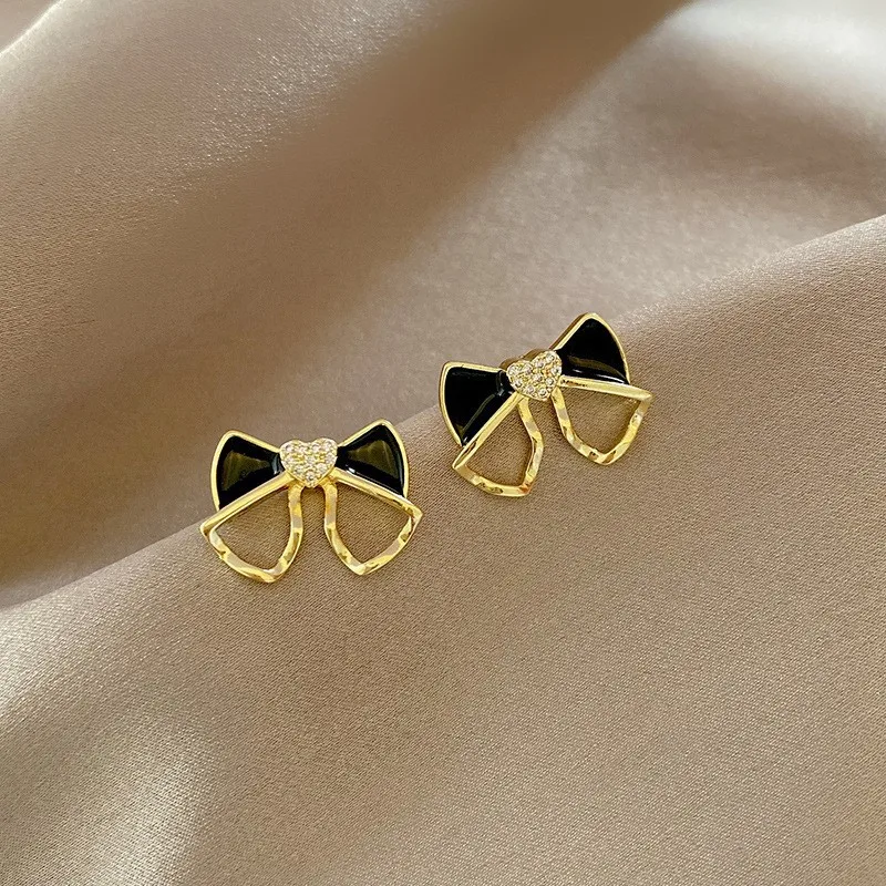 Cute Small Bow Stud Earrings for Women Hollow Out Metal White Black Enamel Oil Crystal Heart Earrings Sweet Party Jewelry Gift