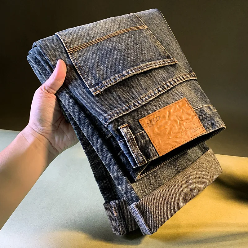 Vaqueros de mezclilla lavados retro de alta gama para hombres en otoño de 2025, nueva ropa para hombres versión coreana pantalones sueltos y suaves de tubo recto