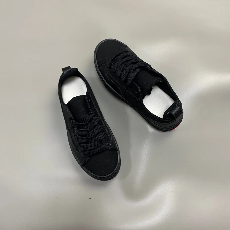 All black splicing low cut canvas shoes, pure black versatile casual board shoes, dark style street commuting sports shoes