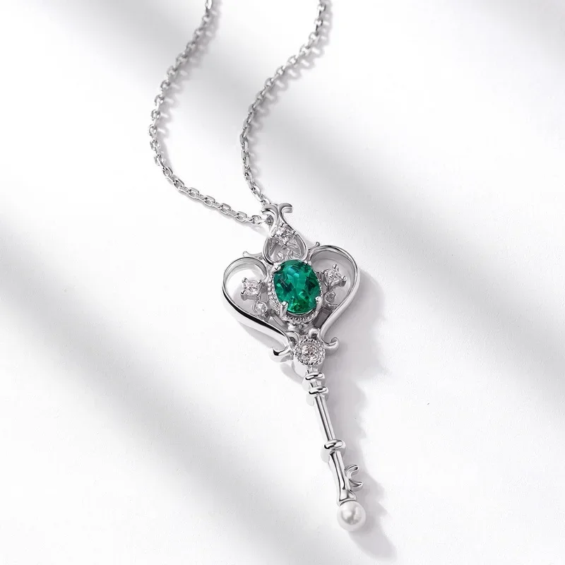 S925 الفضة مطلي 18K الذهب PT950 البلاتين الأوريول الذيل زهرة المرأة زراعة اليشم مفتاح قلادة