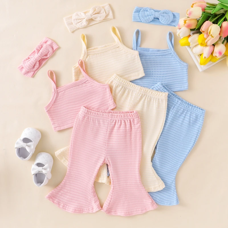 

2024-05-10 Lioraitiin Baby Girl Summer Outfits Solid Color Ribbed Sleeveless Tank Tops Flare Pants Headband 3Pcs Clothes Set