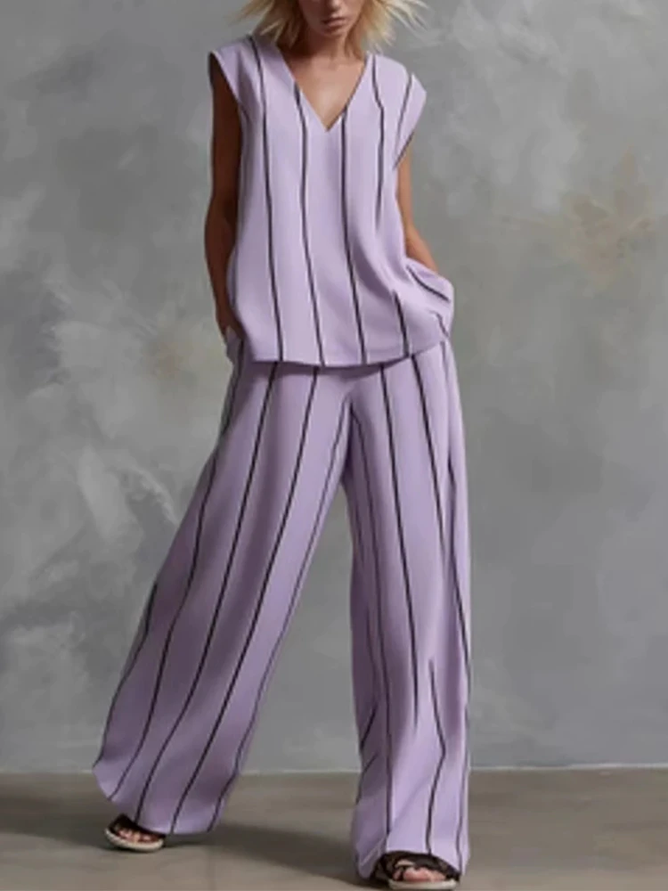 Conjunto de dos piezas con top sin mangas con cuello en V y pantalones de pierna ancha con estampado de rayas verticales, estilo extremadamente sencillo, holgado y adelgazante.