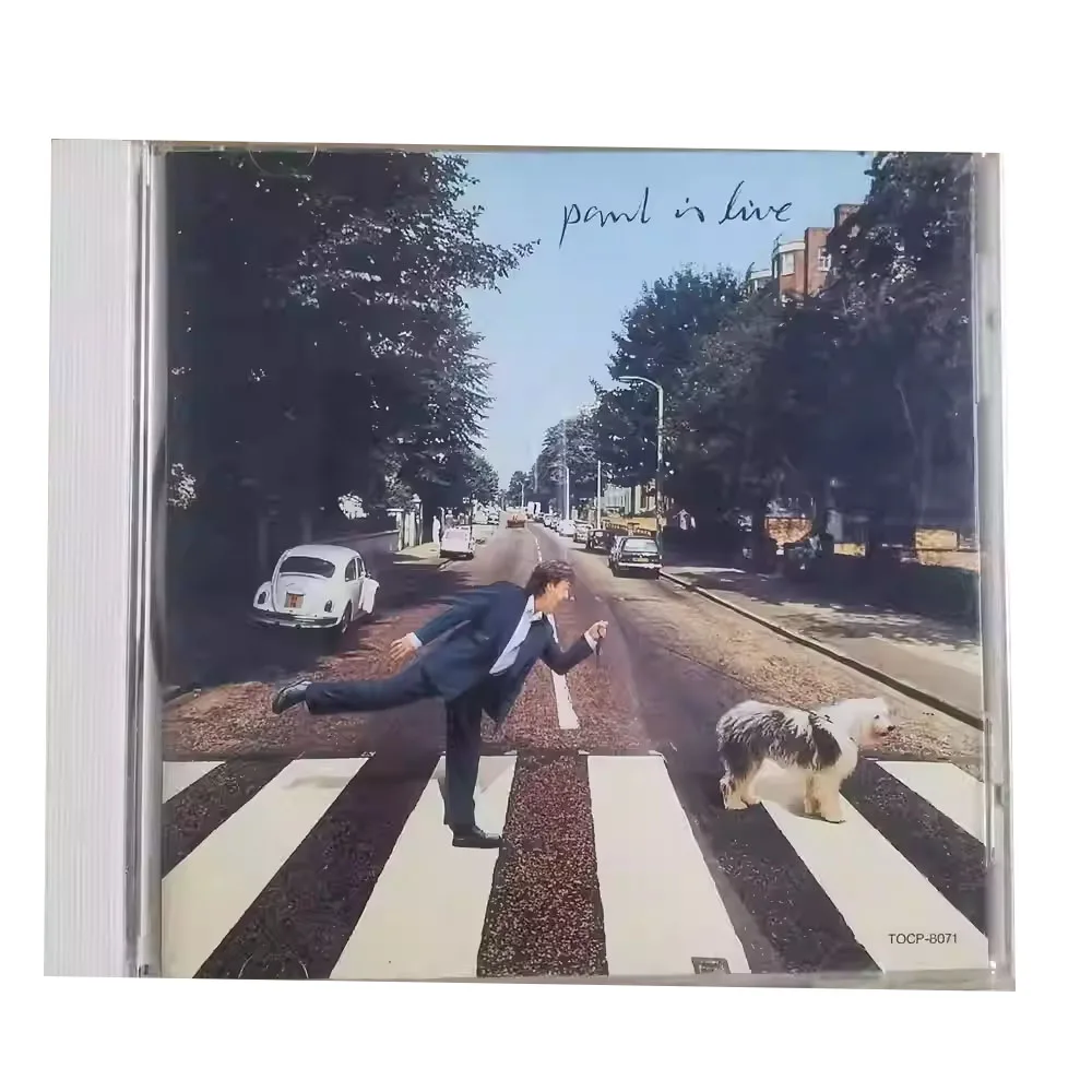 

CDPaul McCartney Paul Is Live The Album Includes Paul McCartney's Live Repertoire, Covering Beatles Classics and Solo Works