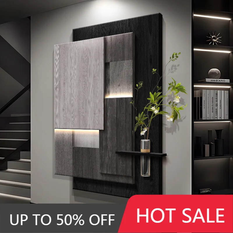 Luxurious and sophisticated entrance LED wall light with lights installed at the entrance, facing the door and hanging a picture