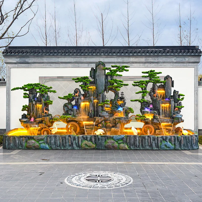 Chinese-style courtyard rockery fish pond, high mountains and flowing water landing, outdoor entrance feng shui wheel fountain