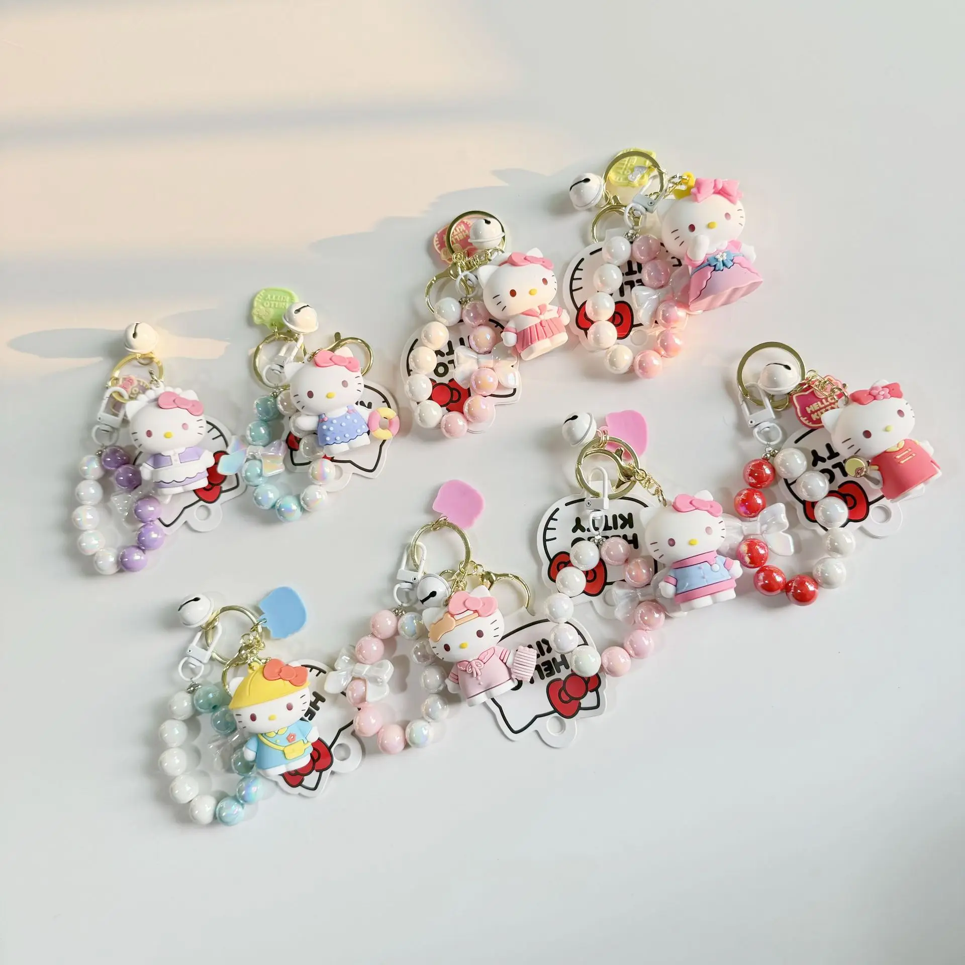 New KT cat mobile phone chain keychain ins girl cute bag pendant handmade beaded bow pendant gift